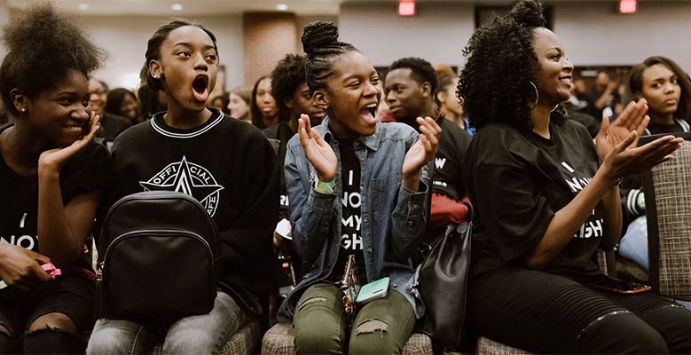 Audience clapping and cheering