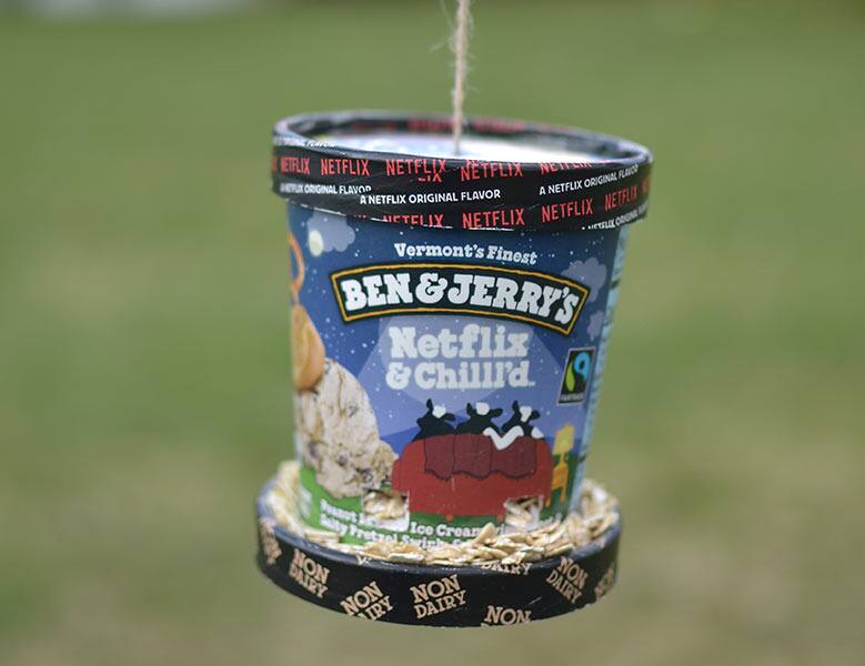 Pint of Ben & Jerry's Netflix & Chilll'd used as a bird feeder