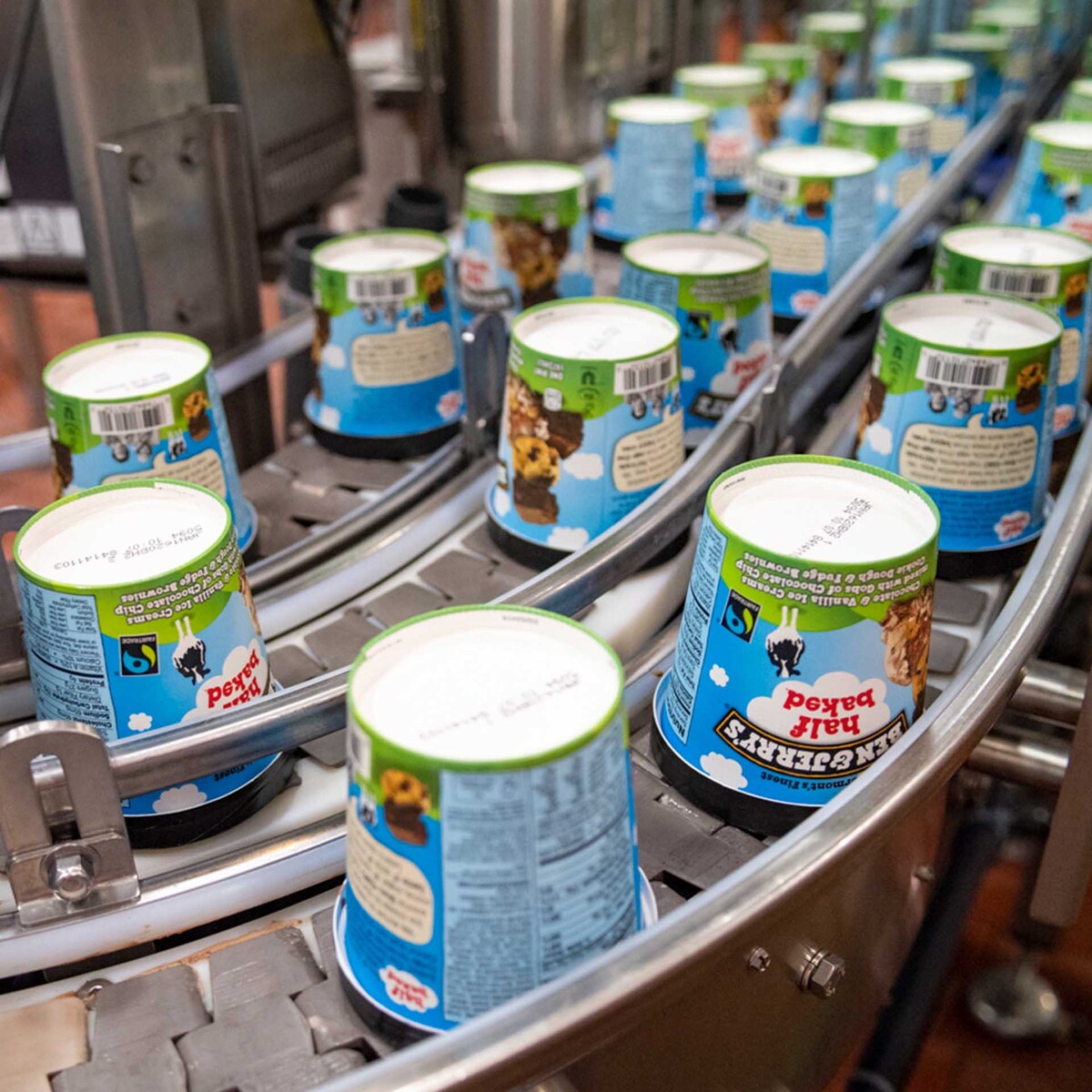 Ben & Jerry's ice cream pints in a factory line